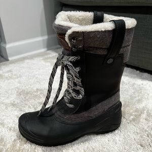 The North Face snow boots; black/gray, cream colored faux fur lining. Size 9.